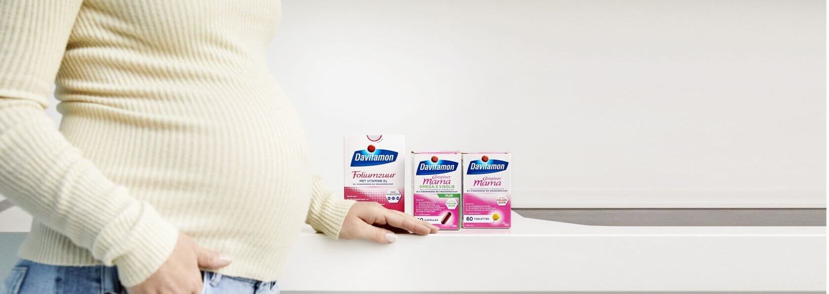 Zwangere vrouw met Davitamon supplementen